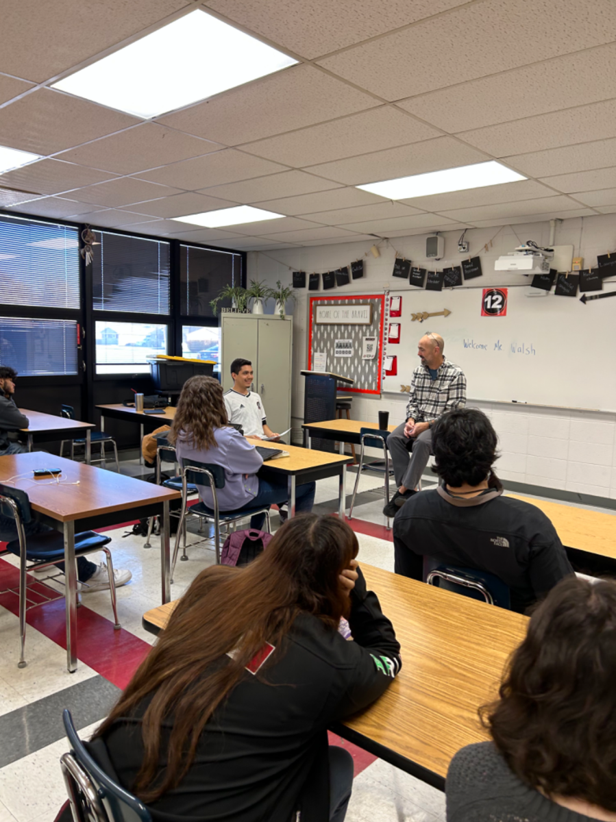 Sebastian Bocanegra Macias interview Mr. Walsh about what it is like to be a math teacher. Students participate in career interviews as part of the senior year College and Career Readiness course.